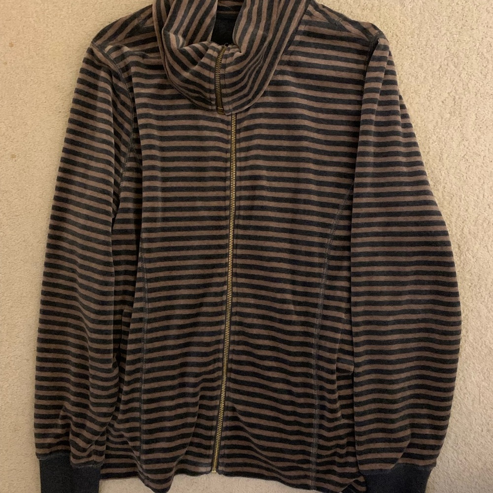 Women’s soft comfortable zipper sweater.  New without tags